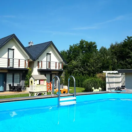 Dom wakacyjny Niebiańskie Zacisze-domki Z Sauną I Basenem Odargowo